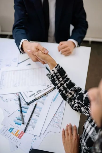 negotiation meeting room table documents/ handshake deal closeup/ price tag comparison chart/ businesspeople talking across desk/ factory floor ceramic tiles/ packing boxes with logo/ credit card and cash/ contract signing pen/ customer satisfaction smile